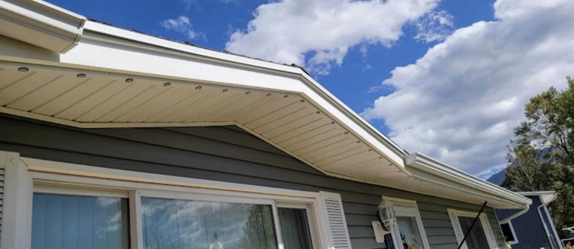 Permanent light pods mounted along a white soffit